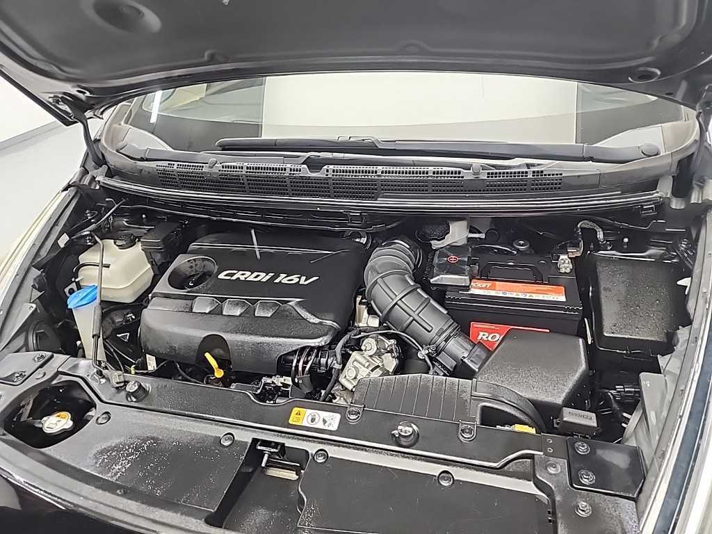 KIA Carens - Vista 5