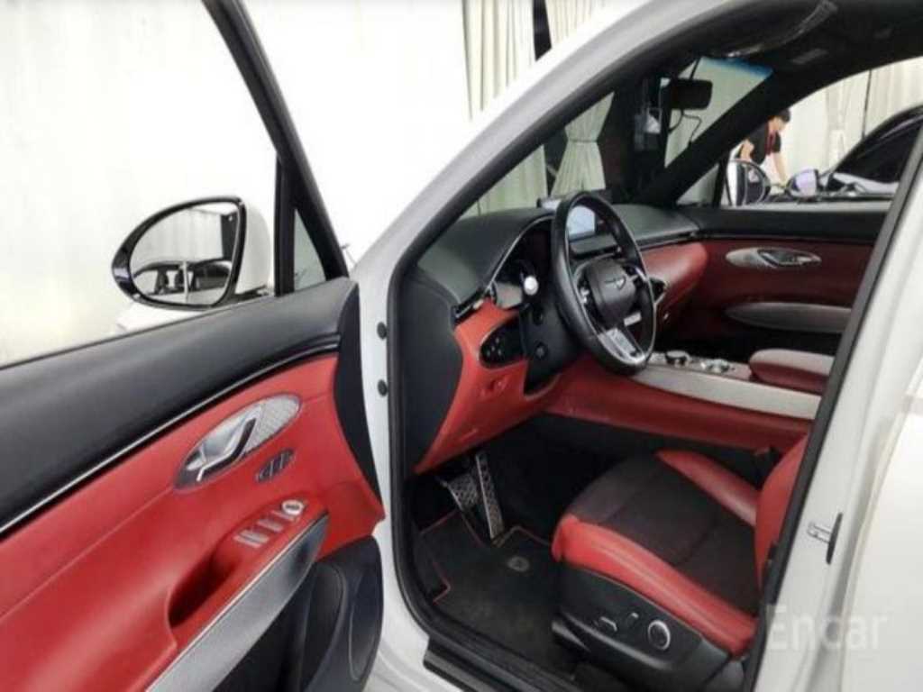 Genesis GV70 - Vista 7