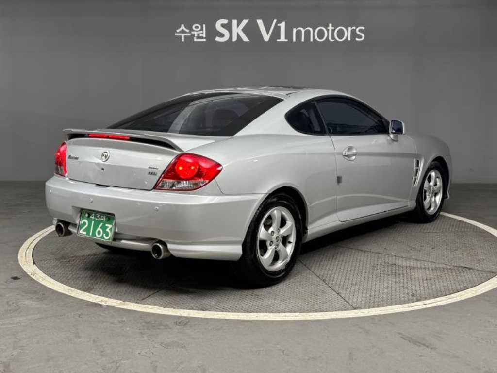 HYUNDAI Tuscani - Vista 4