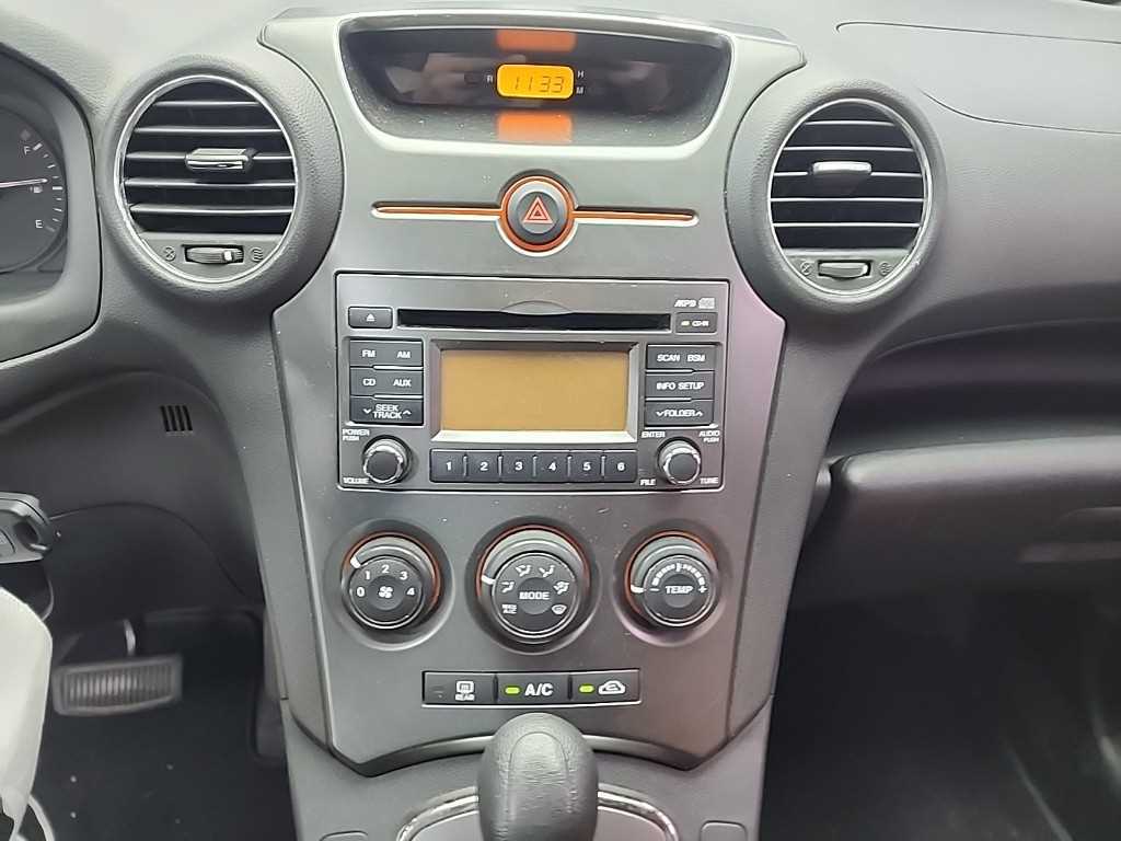 KIA Carens - Vista 9