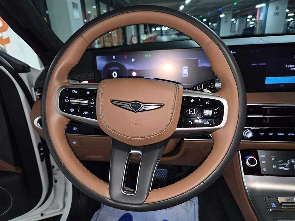 Genesis GV70 - Vista 9