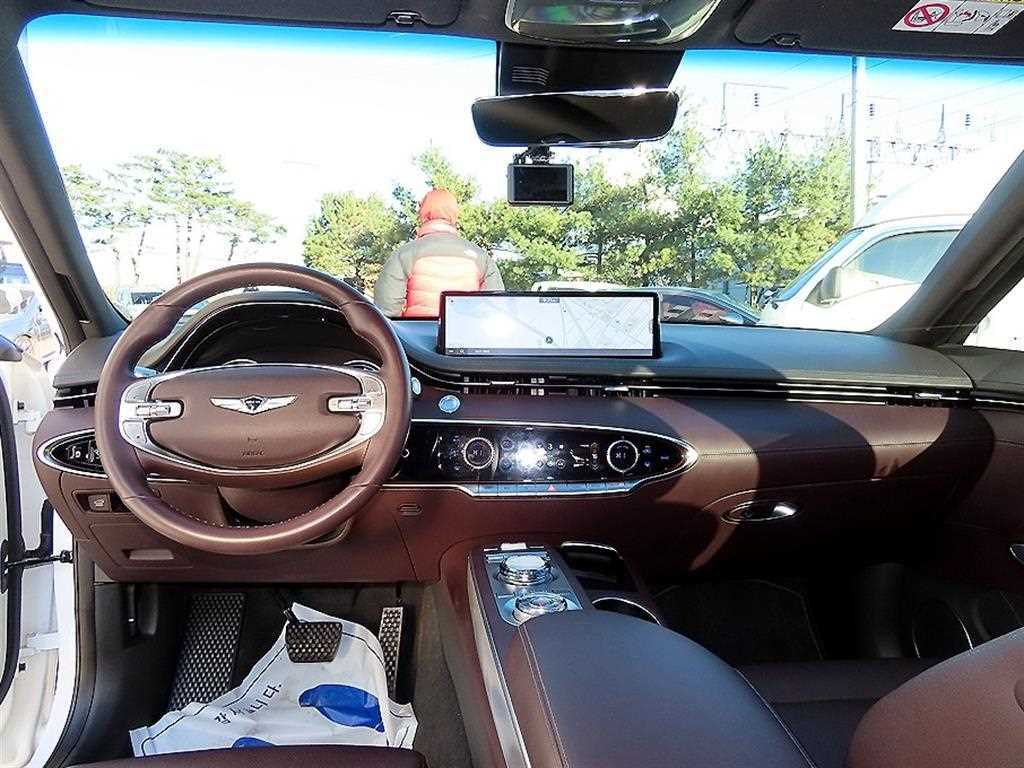 Genesis GV70 - Vista 7