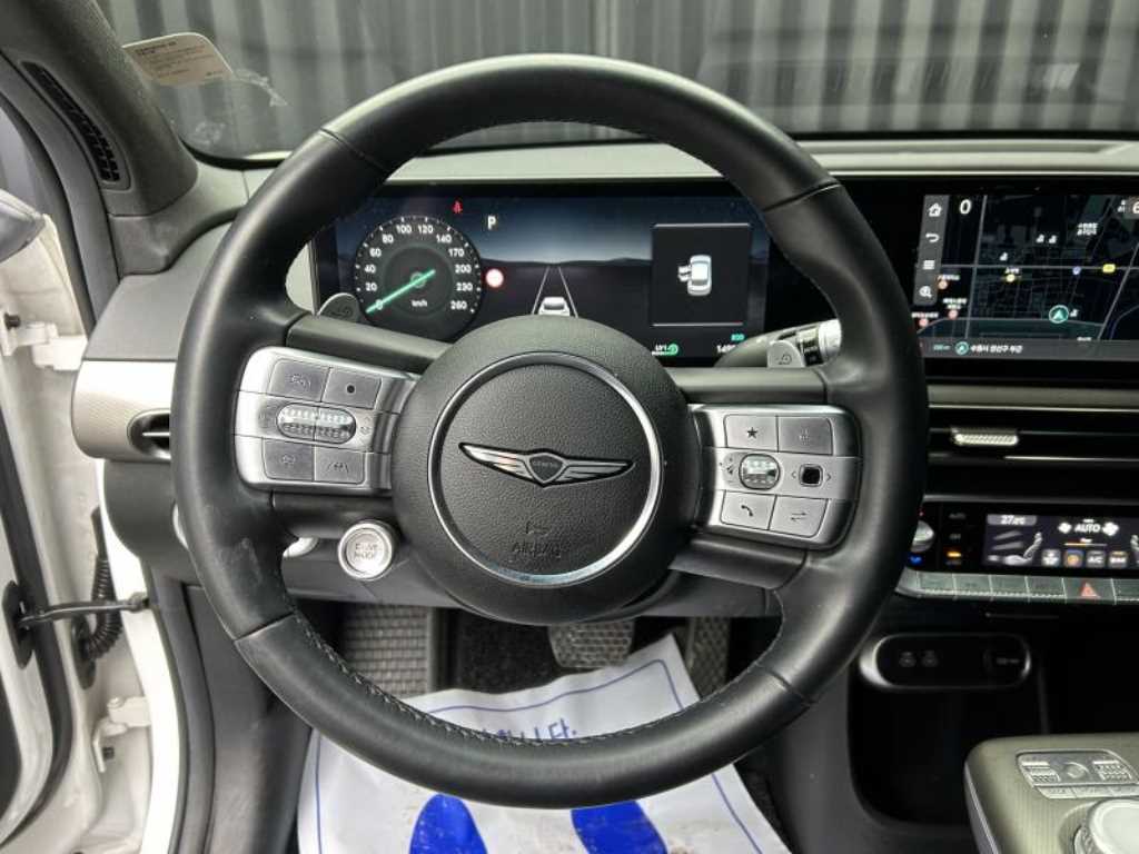 Genesis GV60 - Vista 11