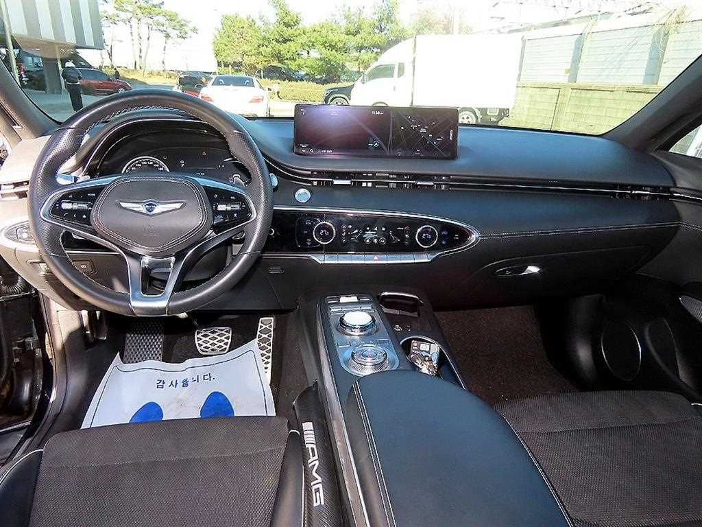 Genesis GV70 - Vista 7