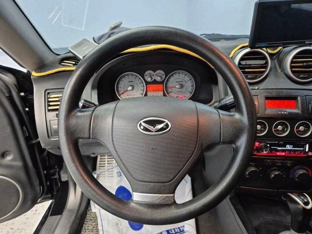 HYUNDAI Tuscani - Vista 9