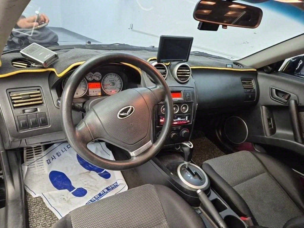 HYUNDAI Tuscani - Vista 7