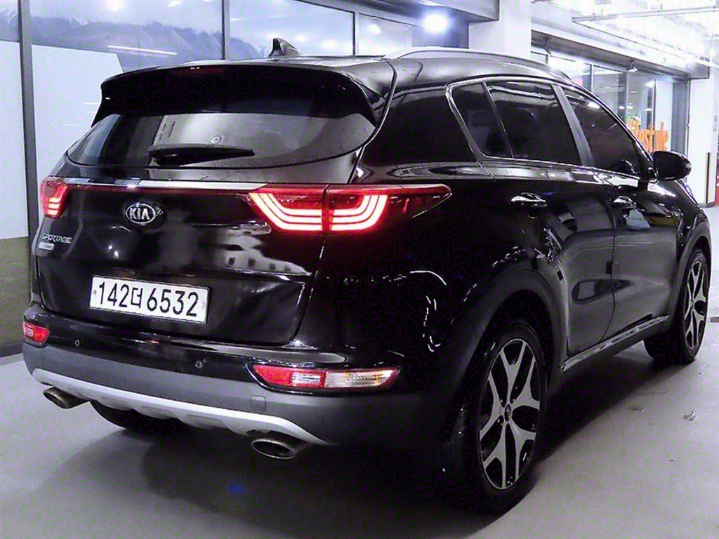 KIA Sportage - Vista 4