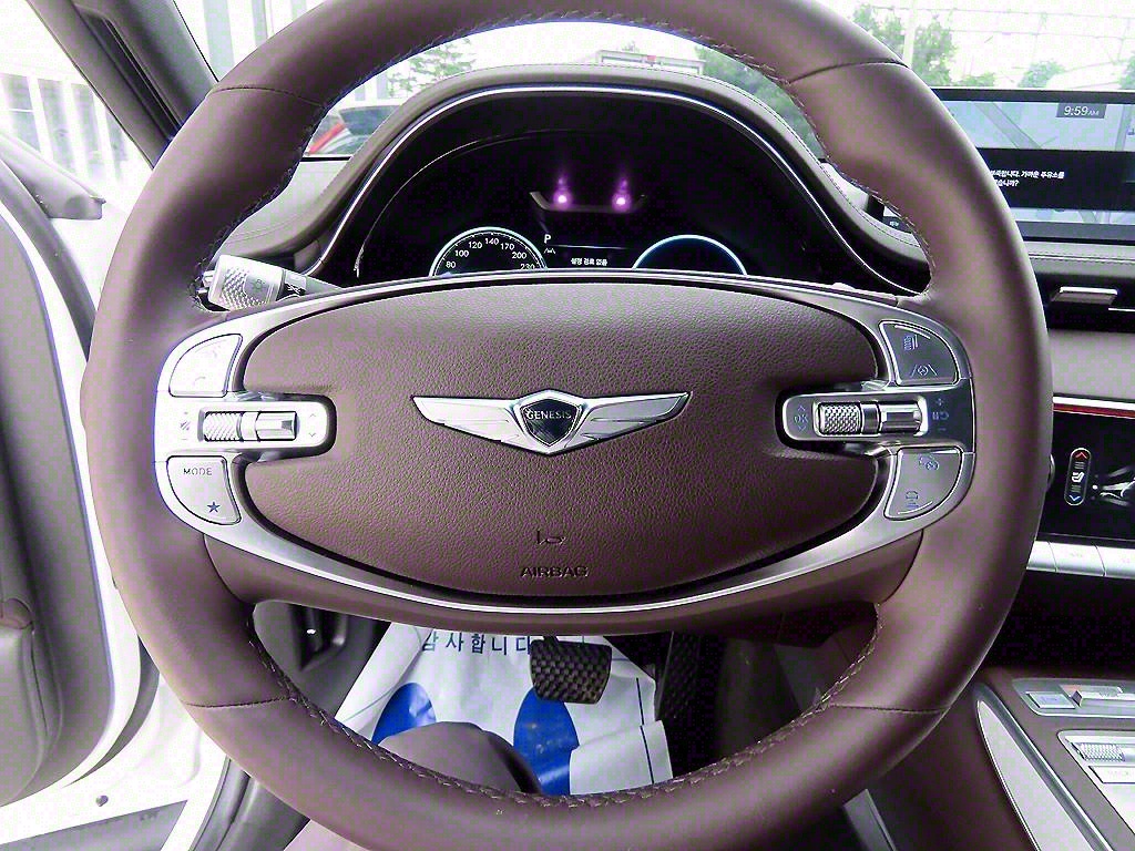 Genesis GV70 - Vista 8