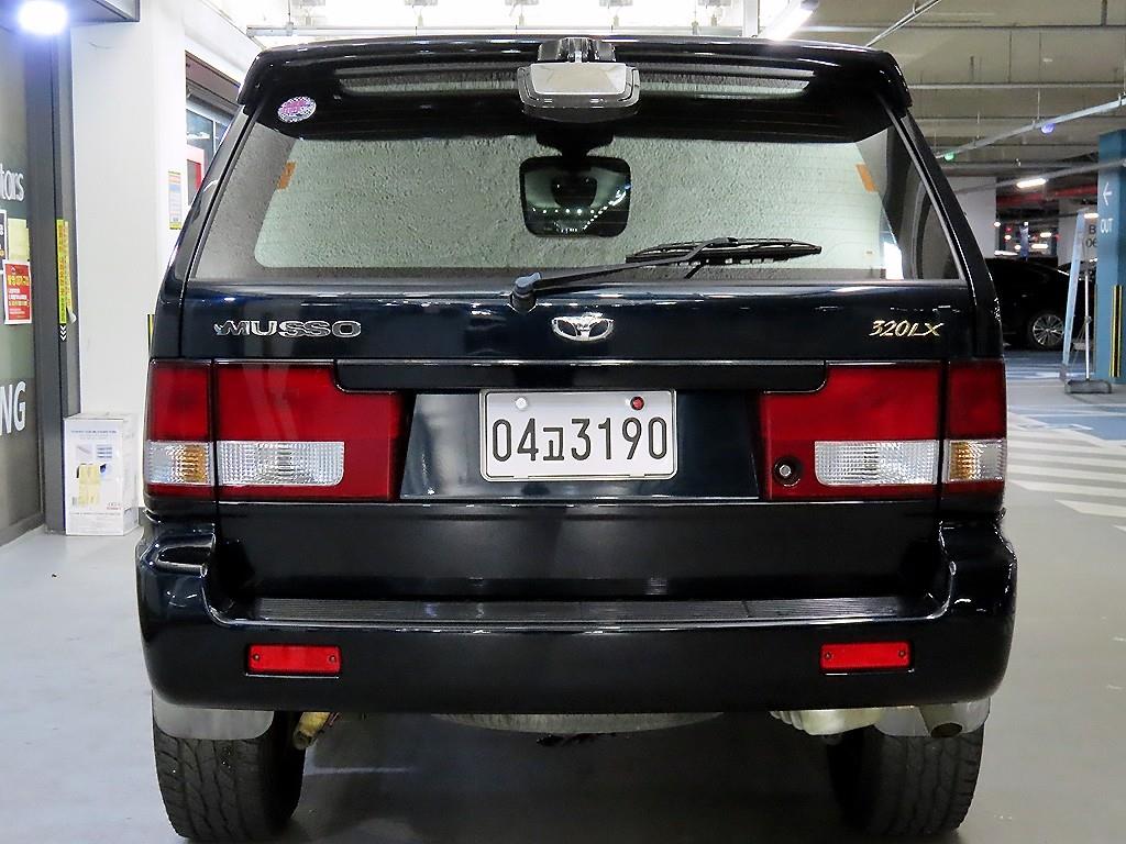 Ssangyong Musso - Vista 5