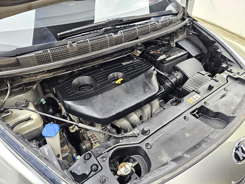 KIA Carens - Vista 6