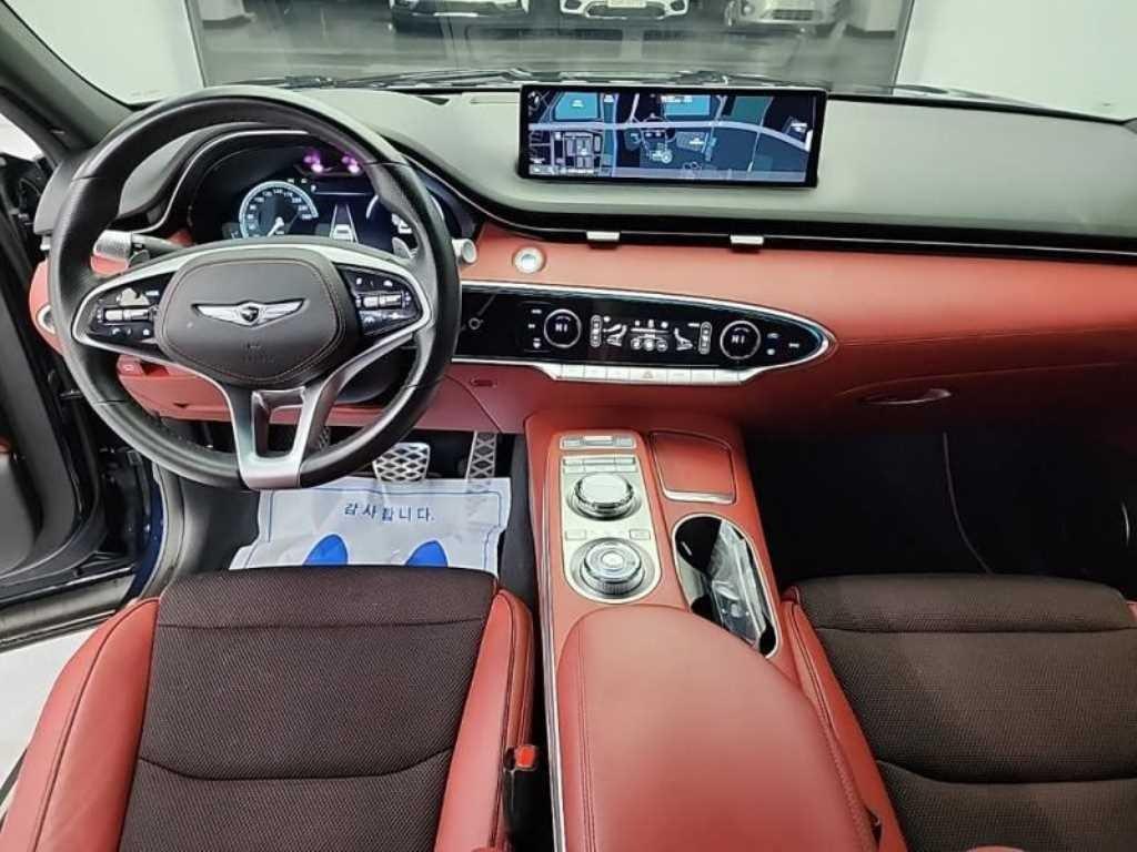 Genesis GV70 - Vista 7