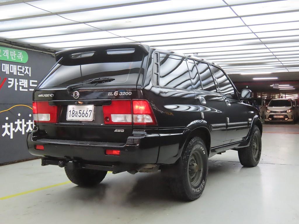 Ssangyong Musso - Vista 4