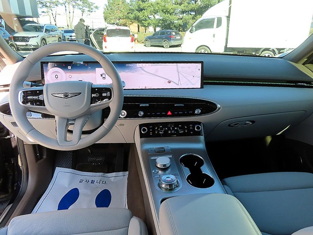 Genesis GV70 - Vista 7