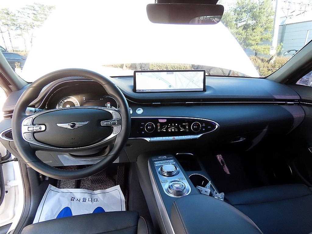 Genesis GV70 - Vista 7