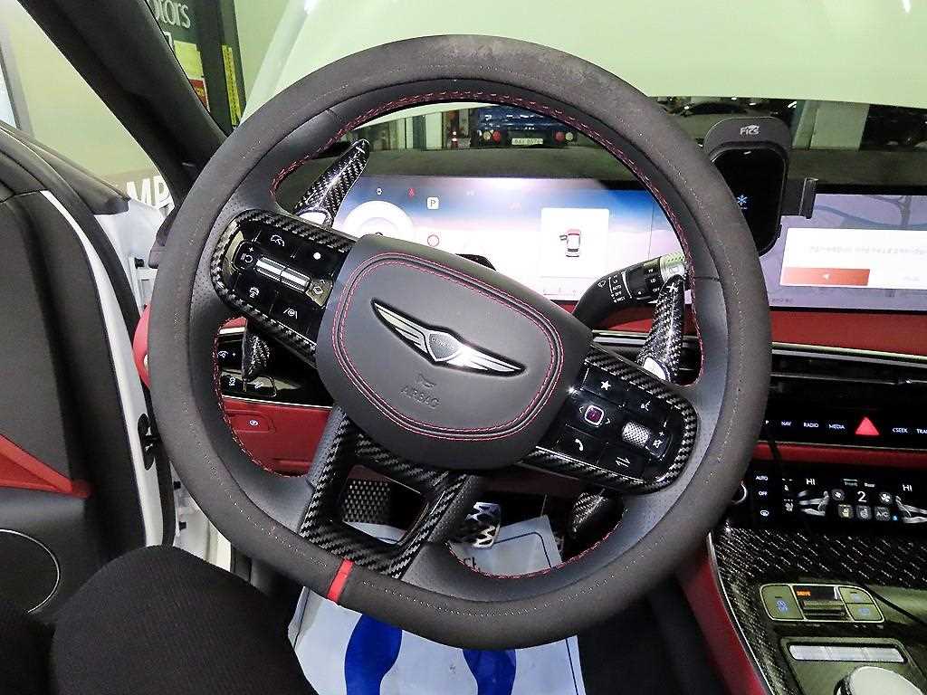 Genesis GV70 - Vista 8