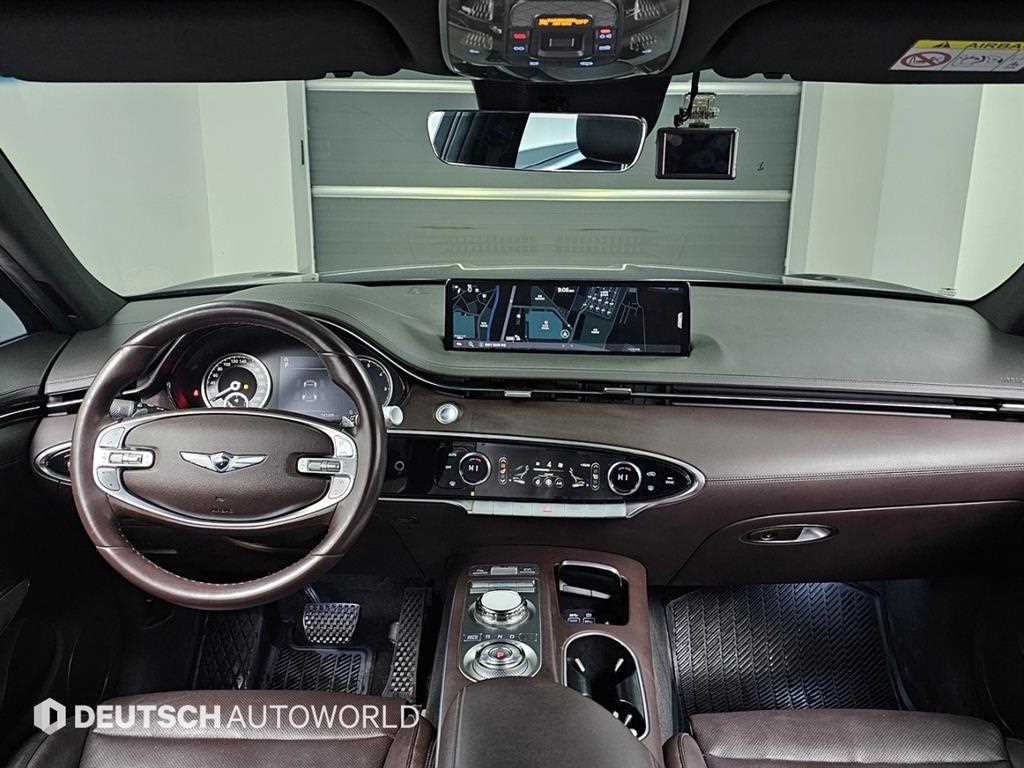 Genesis GV70 - Vista 7