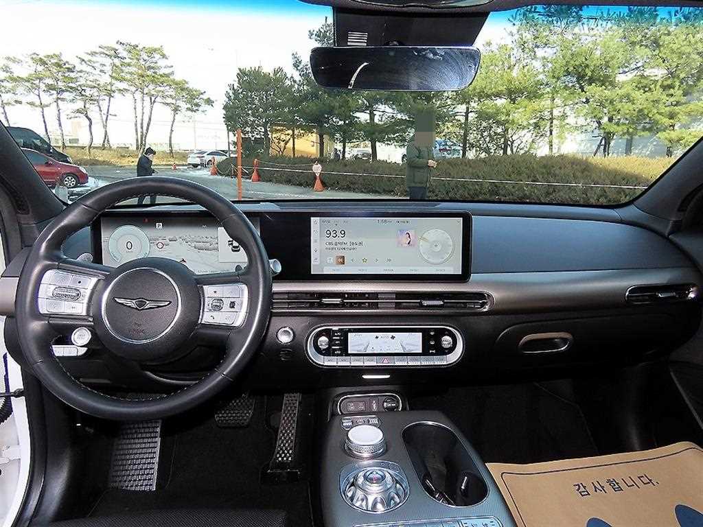 Genesis GV60 - Vista 7