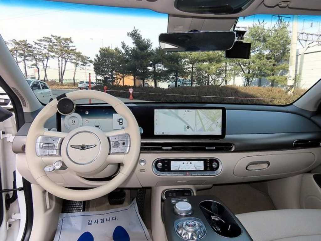 Genesis GV60 - Vista 7