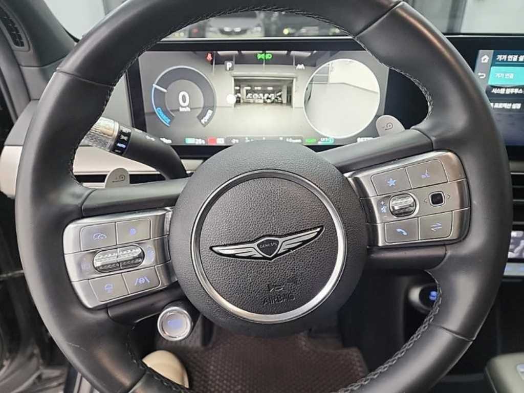 Genesis GV60 - Vista 9