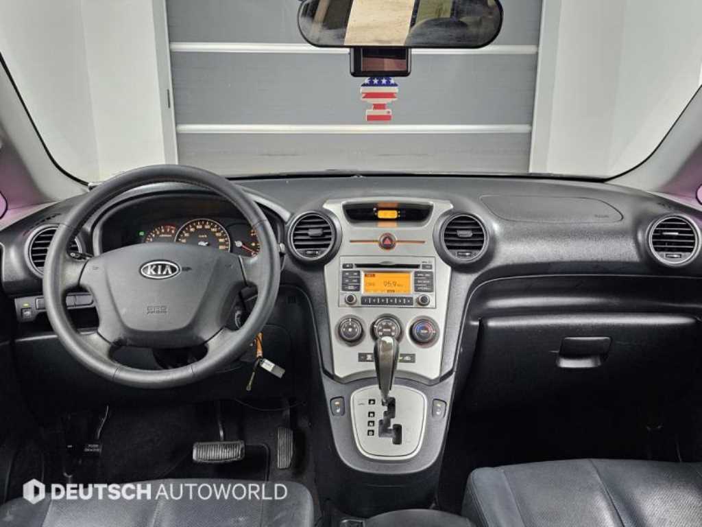 KIA Carens - Vista 7