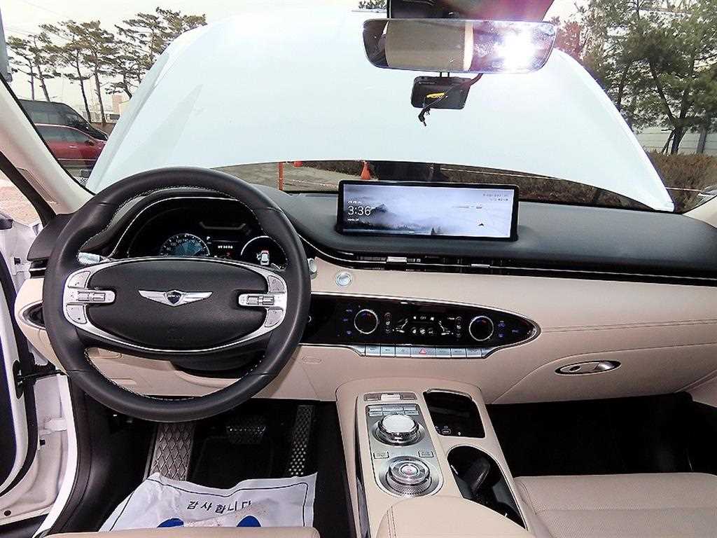 Genesis GV70 - Vista 7