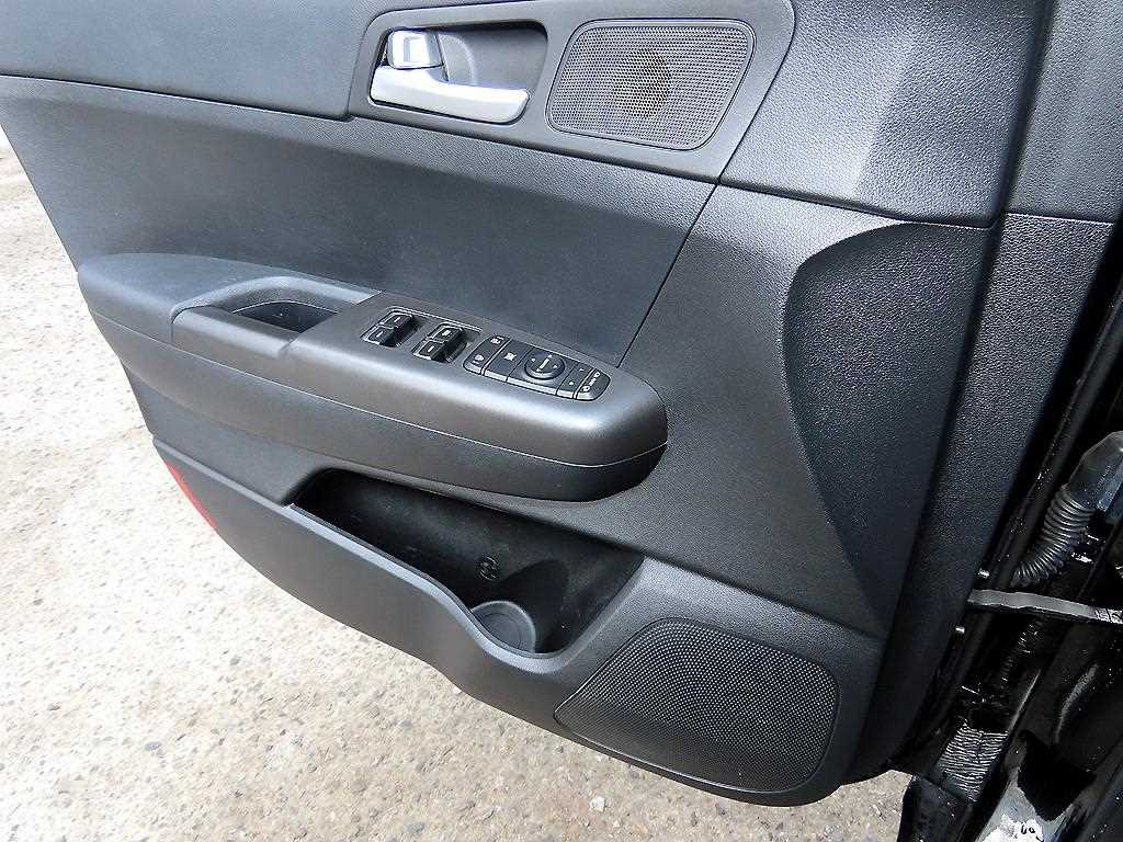 KIA Sportage - Vista 11