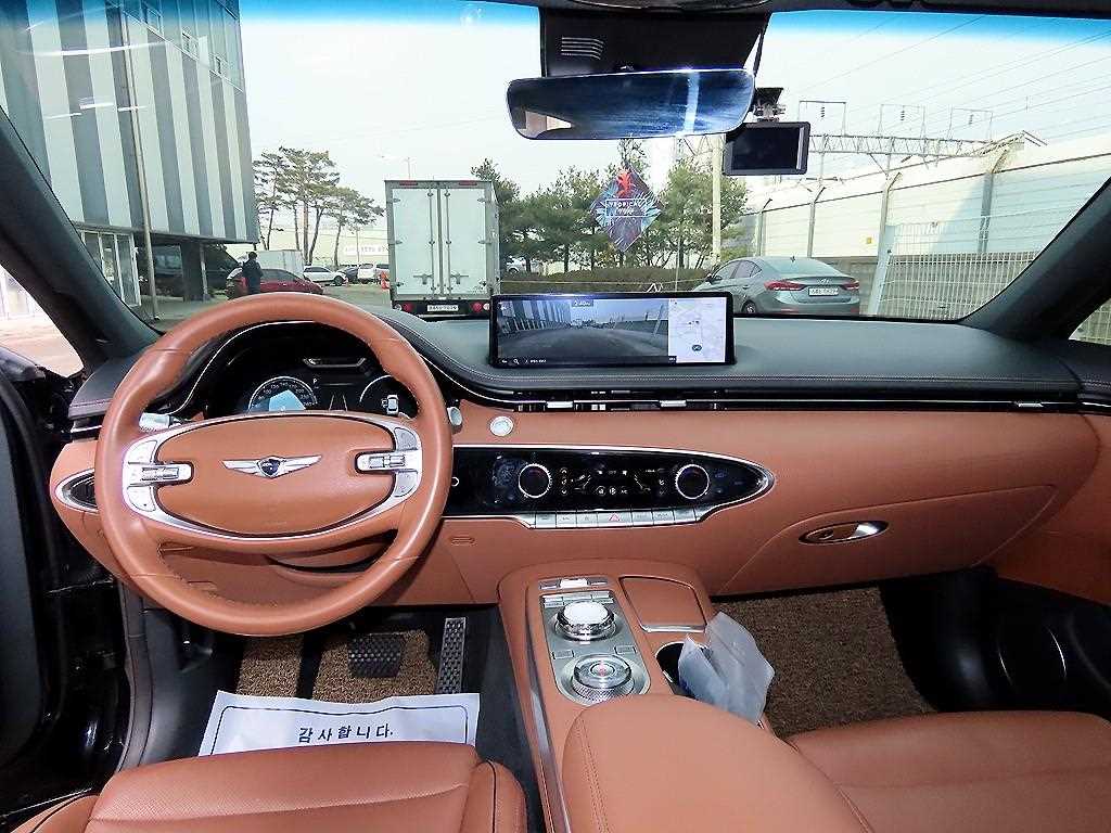 Genesis GV70 - Vista 7