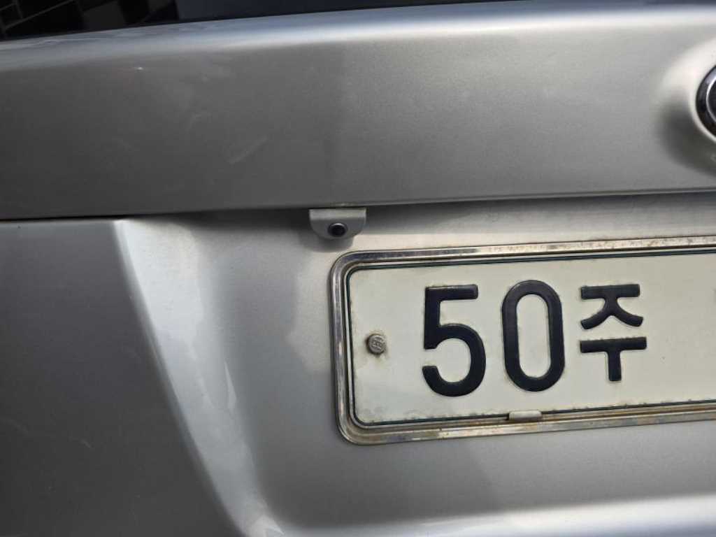 KIA Carens - Vista 4