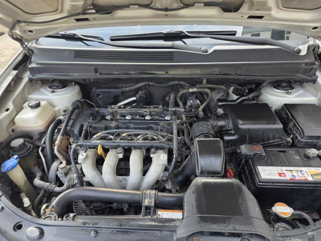 KIA Carens - Vista 8