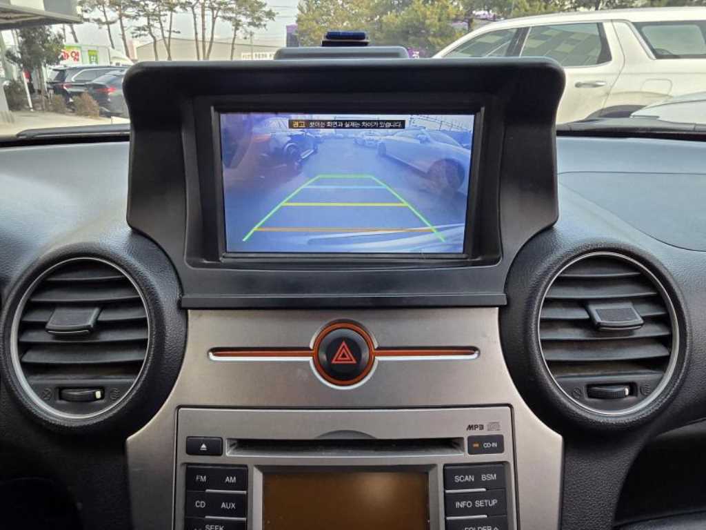 KIA Carens - Vista 10