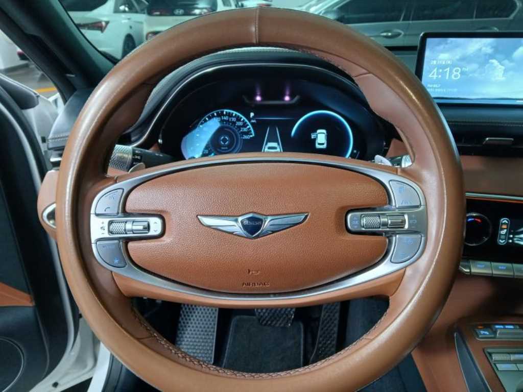 Genesis GV70 - Vista 8