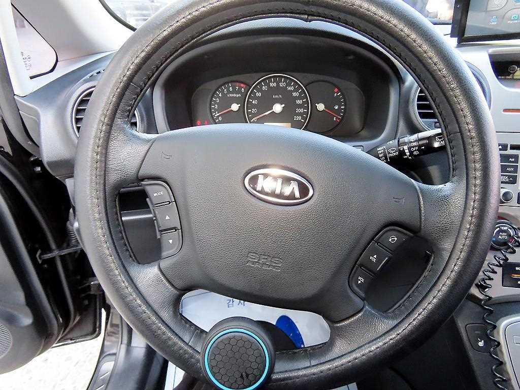KIA Carens - Vista 8