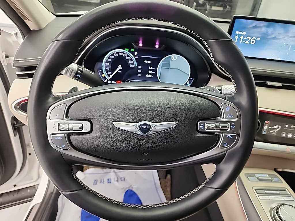 Genesis GV70 - Vista 9