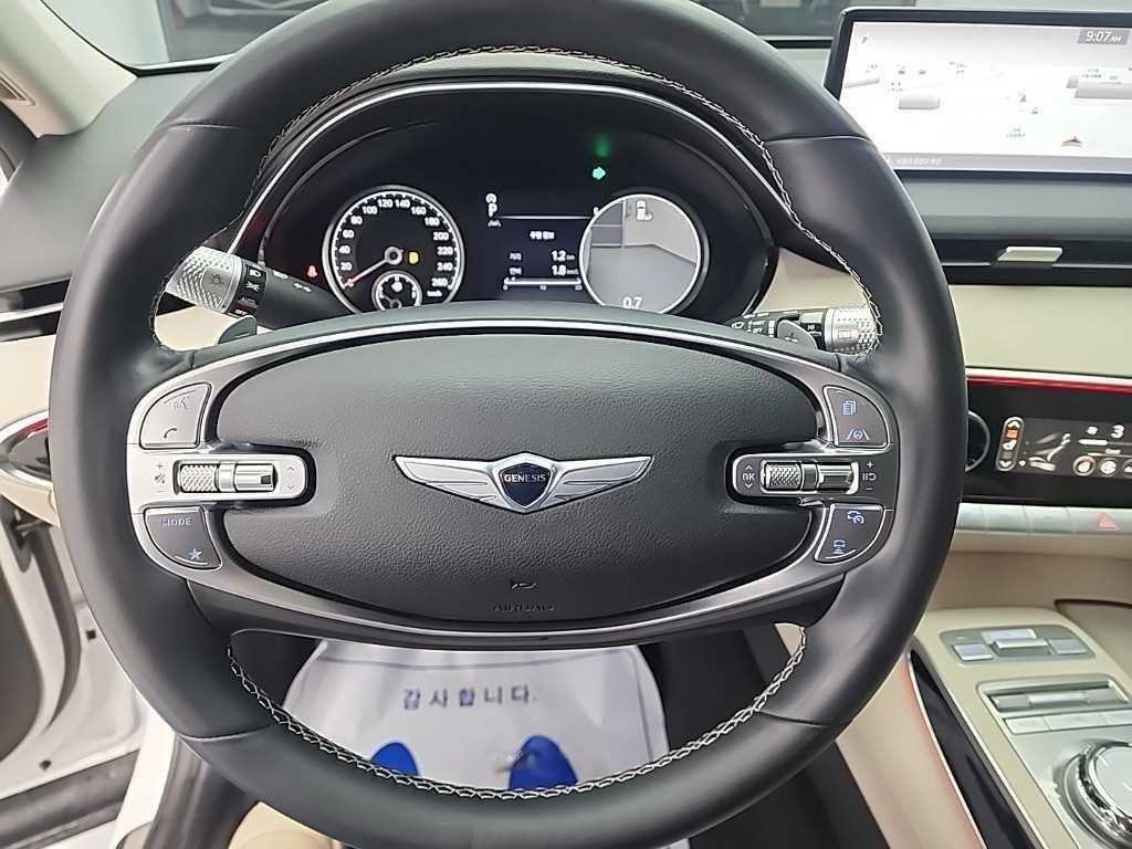 Genesis GV70 - Vista 9