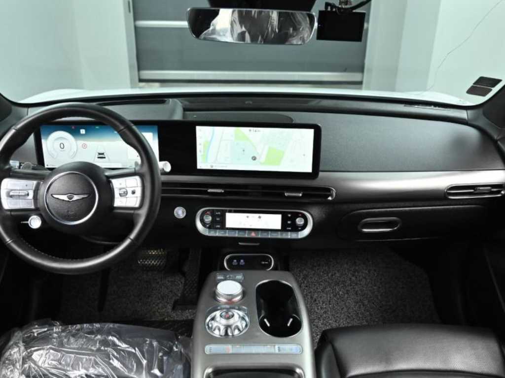 Genesis GV60 - Vista 7