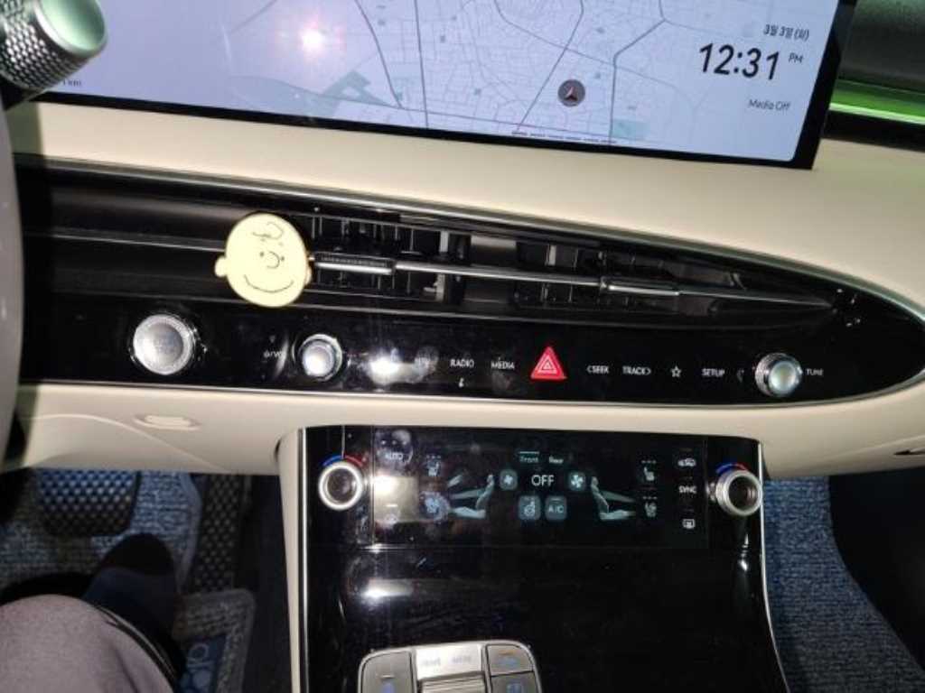 Genesis GV70 - Vista 7