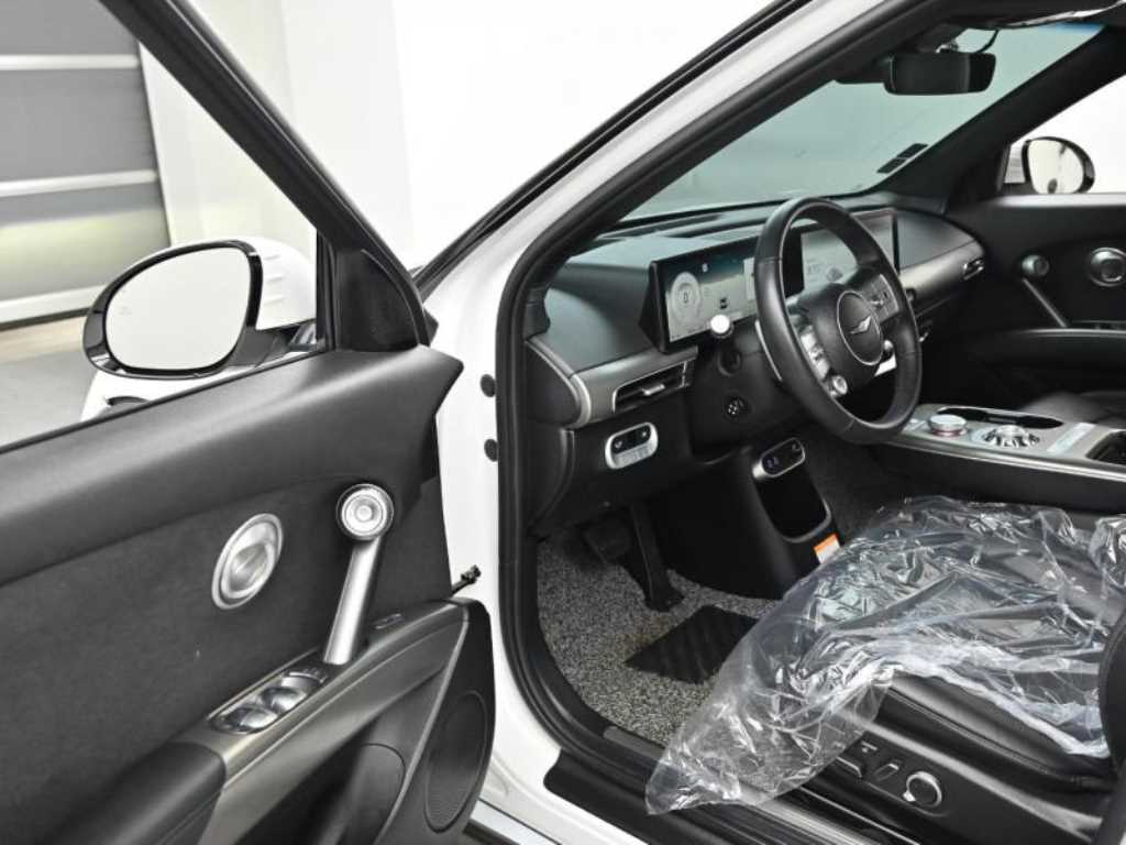 Genesis GV60 - Vista 11