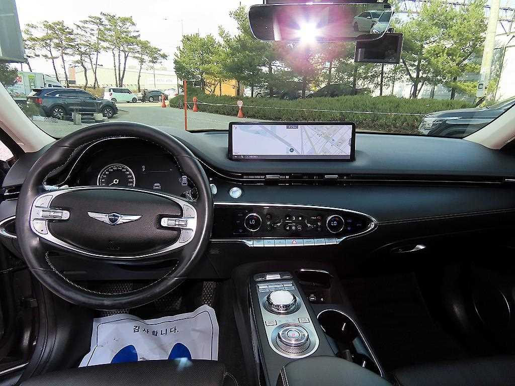 Genesis GV70 - Vista 7