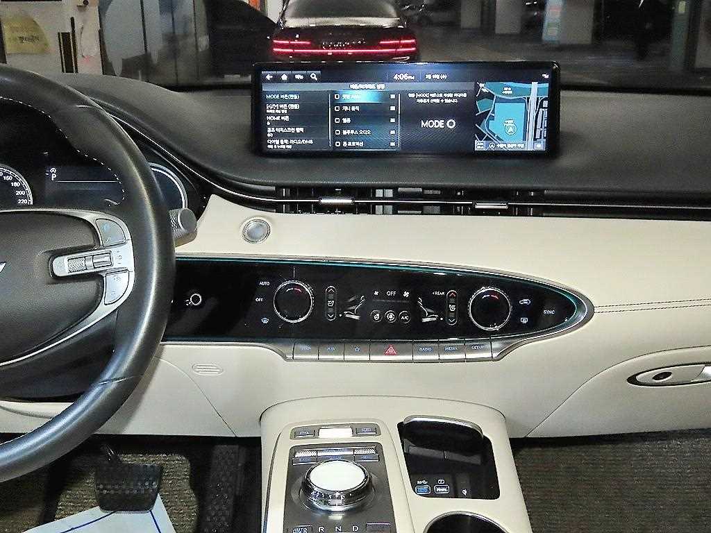 Genesis GV70 - Vista 11