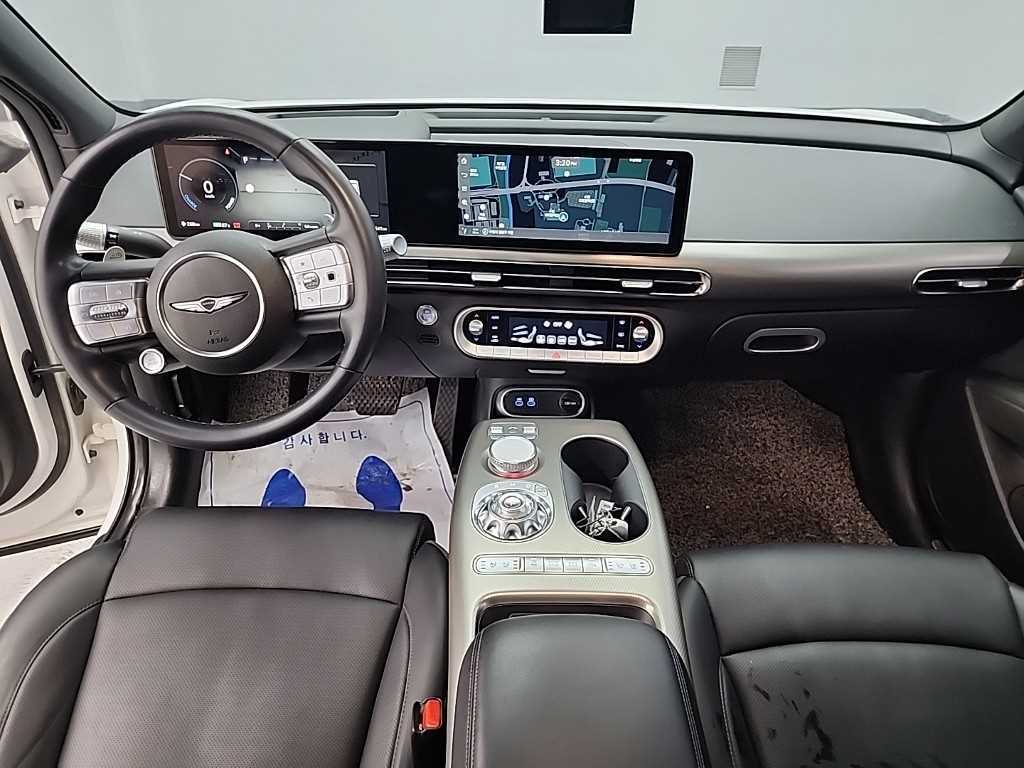 Genesis GV60 - Vista 7