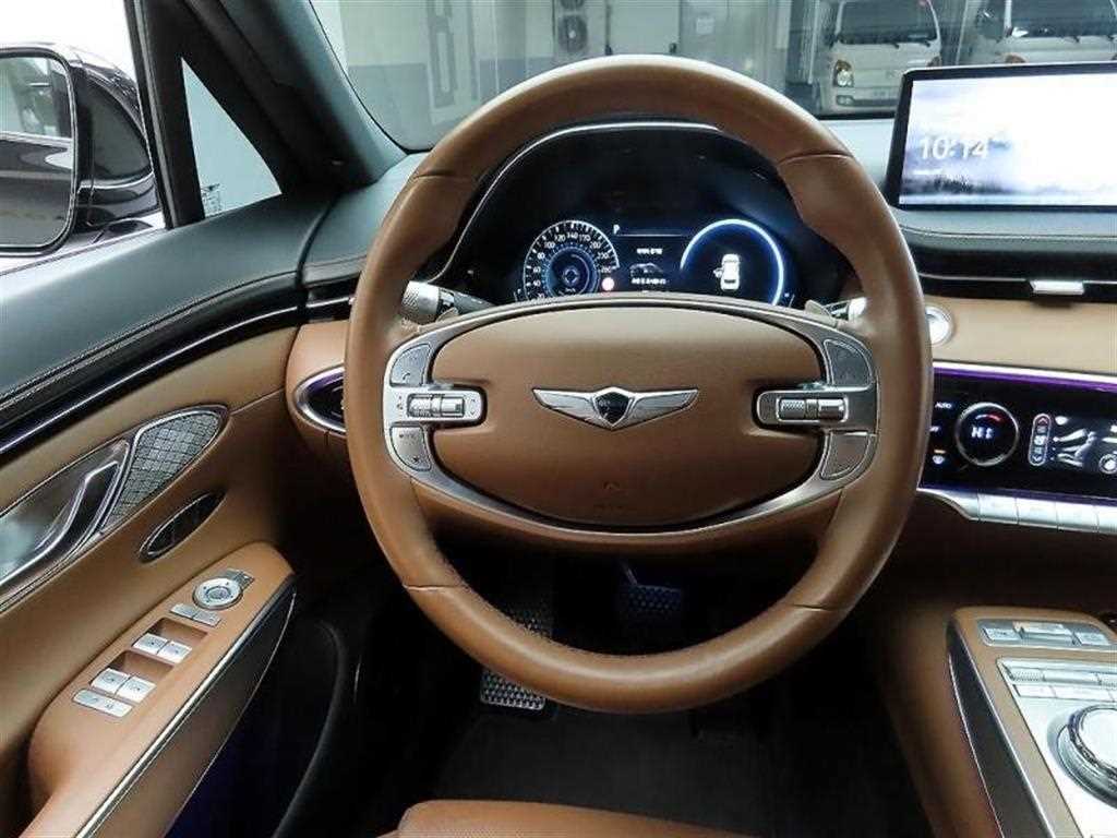 Genesis GV70 - Vista 7