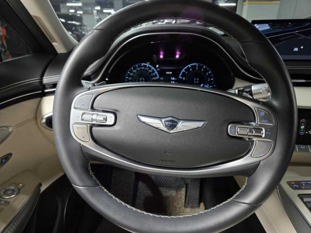 Genesis GV70 - Vista 7