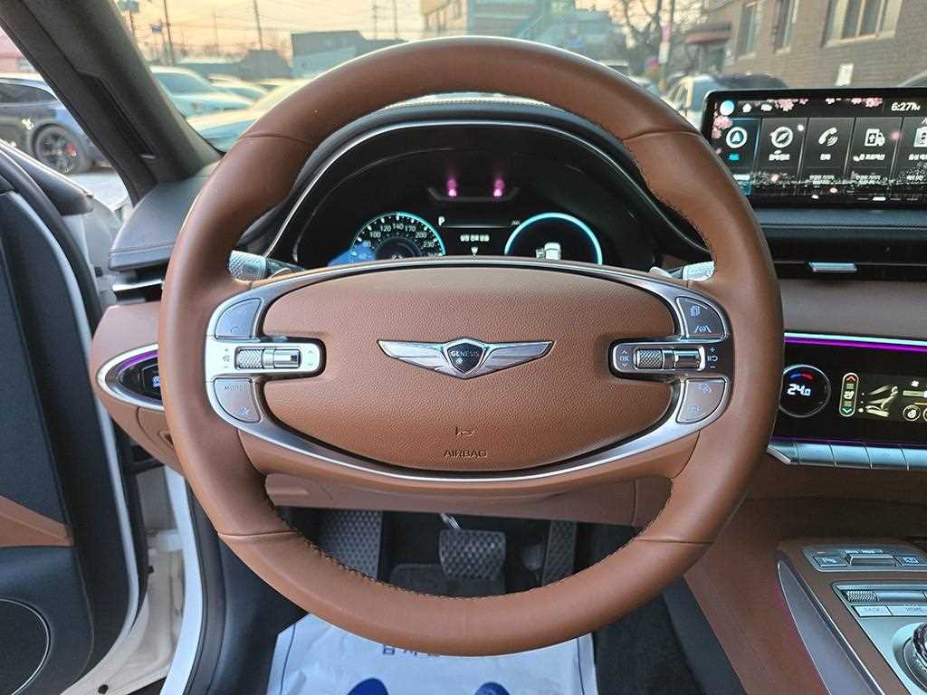 Genesis GV70 - Vista 7