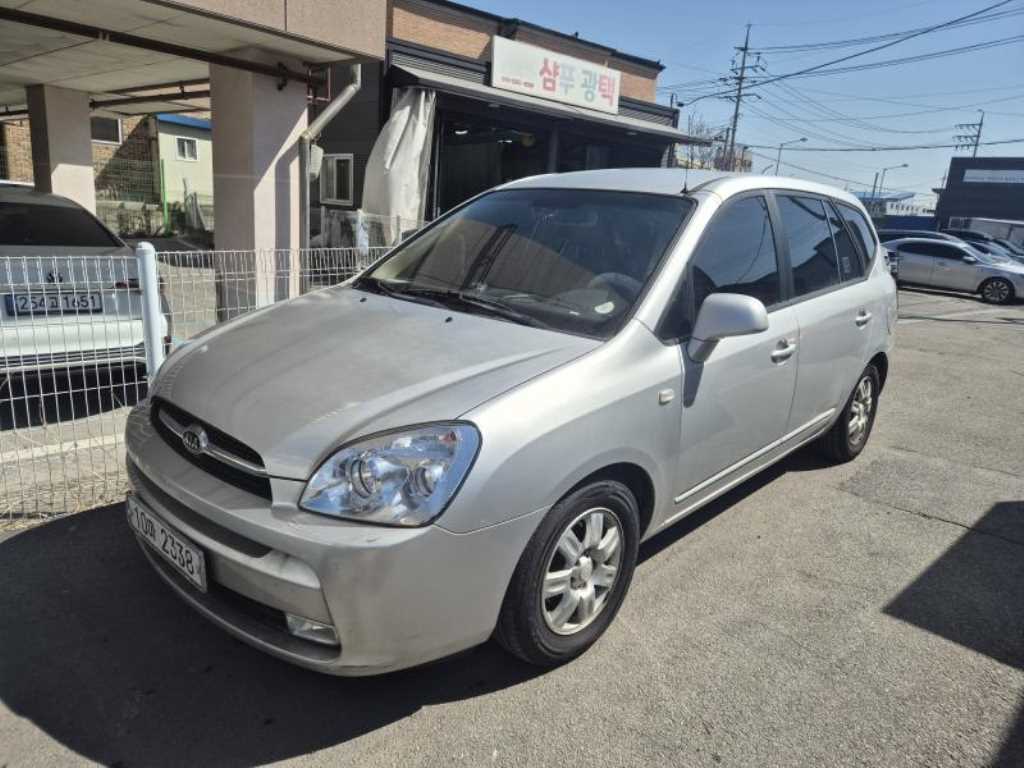 KIA Carens - Vista 8