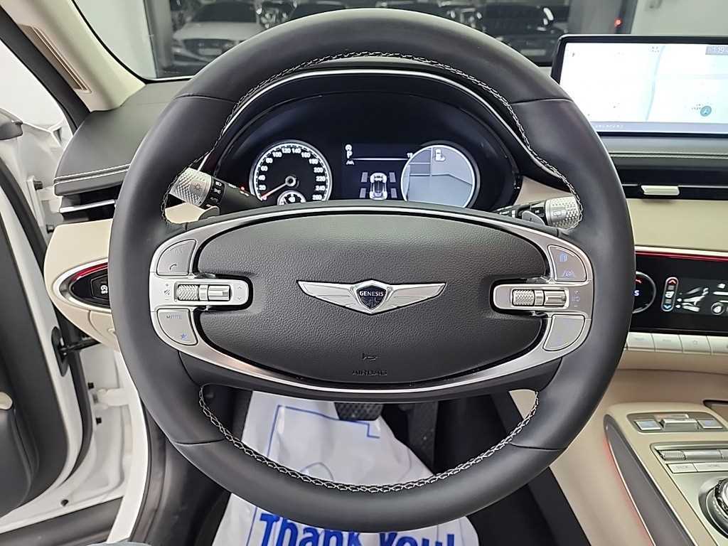 Genesis GV70 - Vista 9