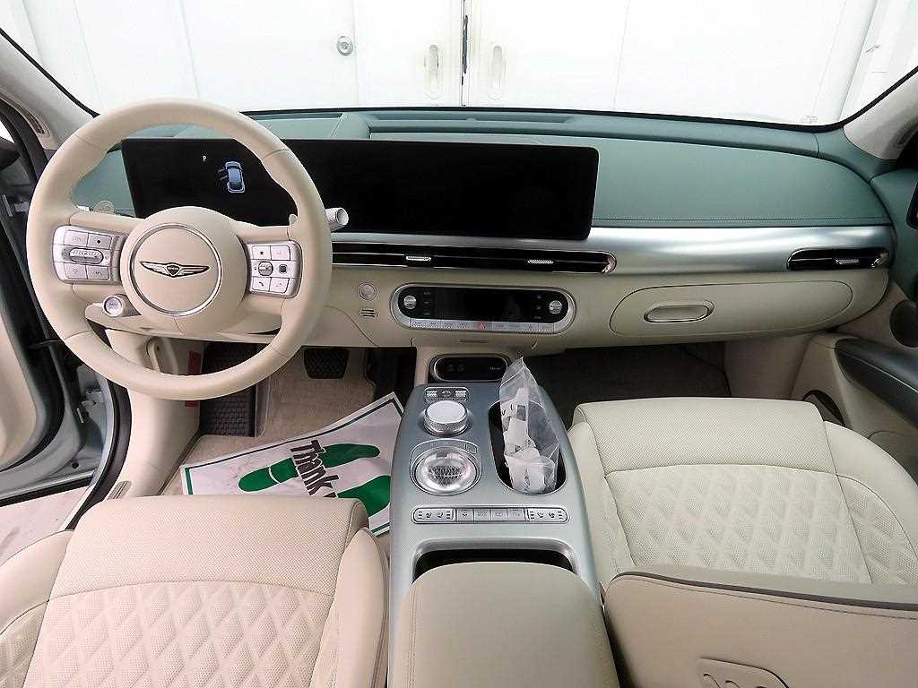 Genesis GV60 - Vista 9