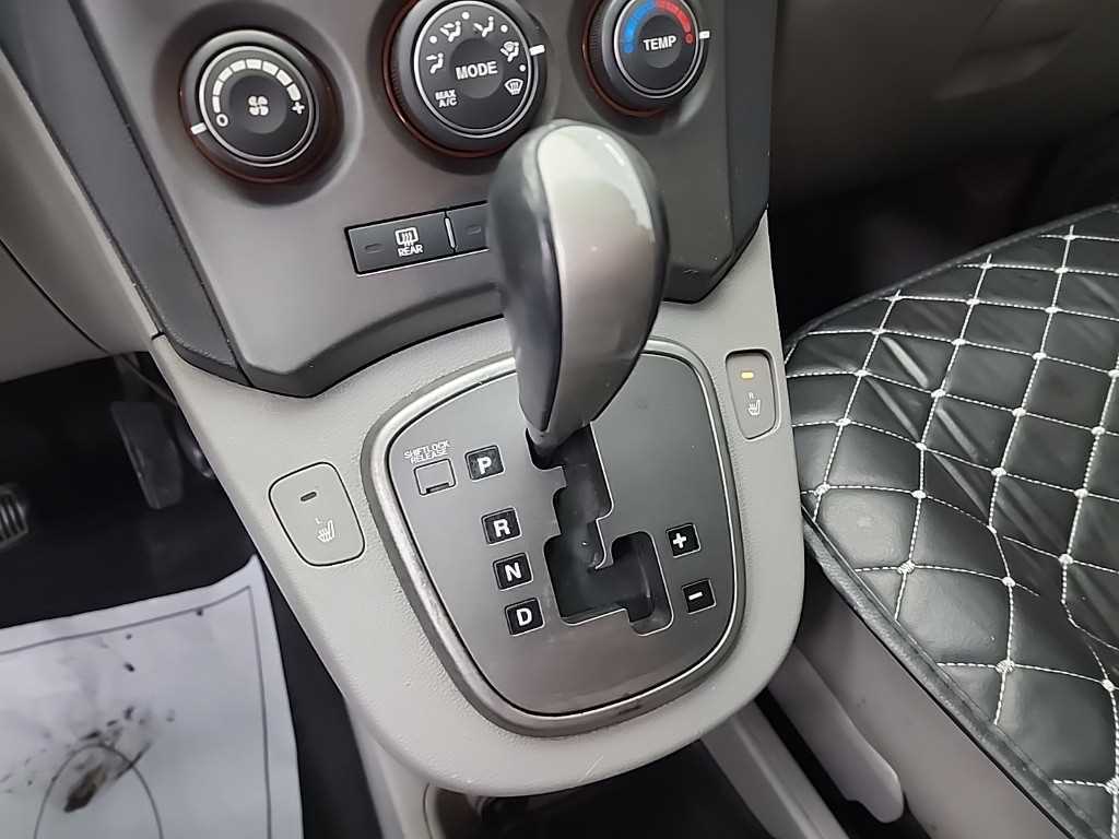 KIA Carens - Vista 8