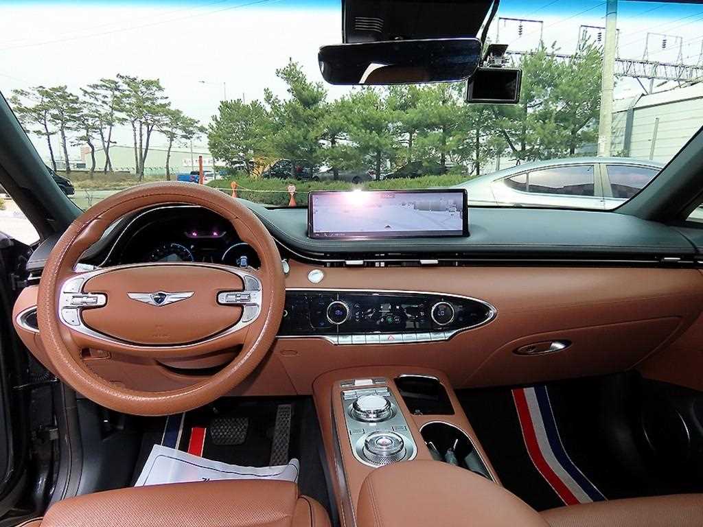 Genesis GV70 - Vista 7