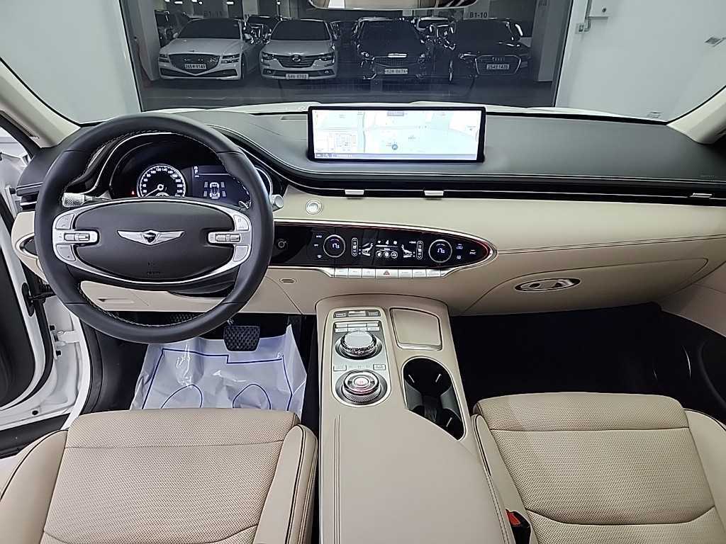 Genesis GV70 - Vista 7