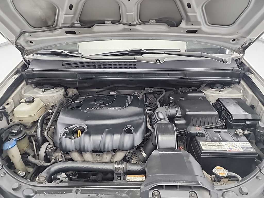 KIA Carens - Vista 5